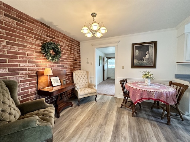 240 Reed St, Lower Burrell, PA 15068 - dining area with a chandelier, wood finished floors, and ornamental molding