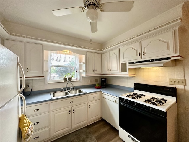 240 Reed St, Lower Burrell, PA 15068 - kitchen with white appliances, under cabinet range hood, dark wood-style floors, backsplash, and ceiling fan