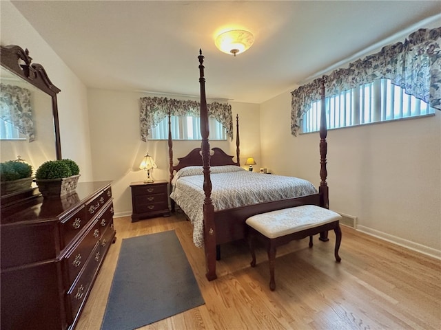 240 Reed St, Lower Burrell, PA 15068 - bedroom with light wood-style flooring and multiple windows