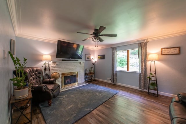 670 Lougeay Rd, Penn Hills, PA 15235 - living area featuring a fireplace, a ceiling fan, ornamental molding, and wood finished floors
