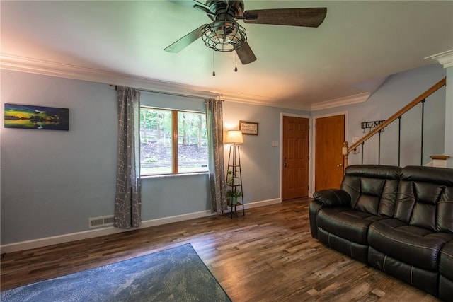 670 Lougeay Rd, Penn Hills, PA 15235 - living area featuring a ceiling fan, ornamental molding, wood finished floors, and stairs