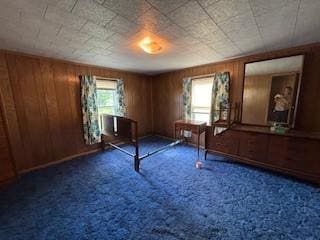 325 Back St, Mount Pleasant Twp Wml, PA 15666 - unfurnished bedroom with carpet floors and wooden walls