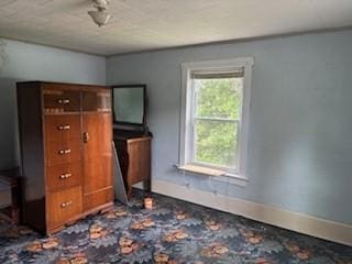 325 Back St, Mount Pleasant Twp Wml, PA 15666 - unfurnished bedroom with baseboards