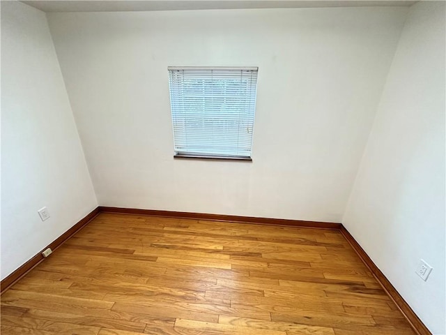 7207 Mcclure Ave, Swissvale, PA 15218 - empty room with wood finished floors and baseboards