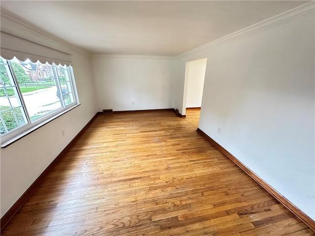 7207 Mcclure Ave, Swissvale, PA 15218 - unfurnished room featuring light wood-style flooring and ornamental molding