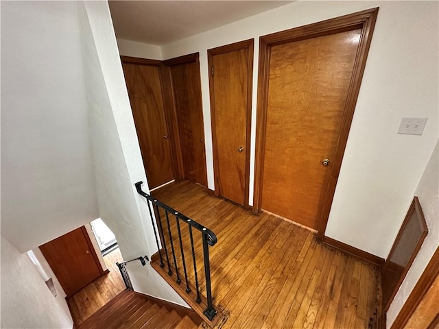 7207 Mcclure Ave, Swissvale, PA 15218 - stairs featuring hardwood / wood-style floors