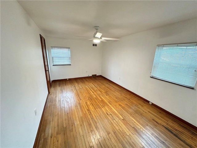 7207 Mcclure Ave, Swissvale, PA 15218 - empty room with light wood-type flooring and ceiling fan