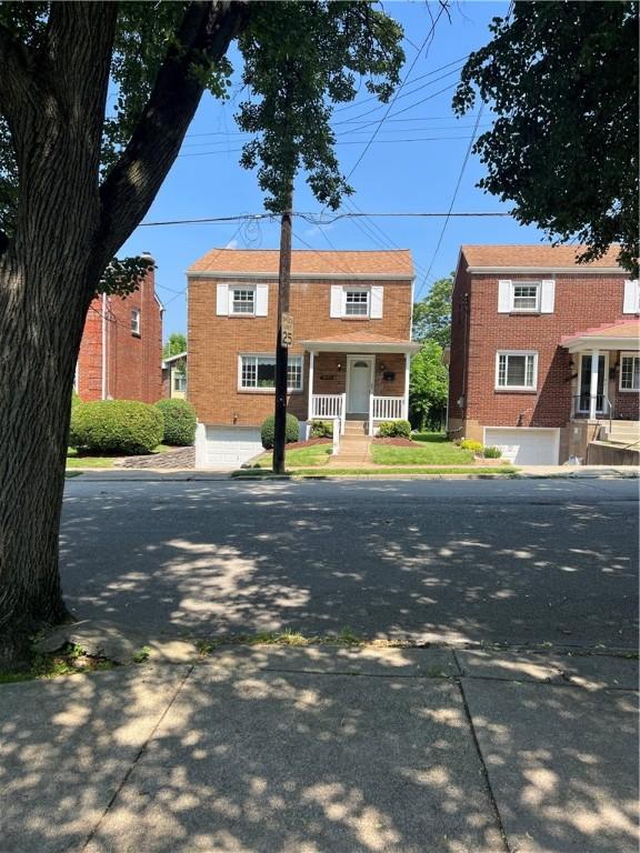 7207 Mcclure Ave, Swissvale, PA 15218 - view of front of home with a porch
