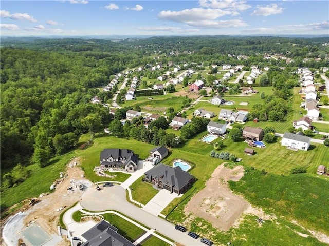 7858 Oscar Ct, North Huntingdon, PA 15642 - aerial view of property and surrounding area featuring a heavily wooded area