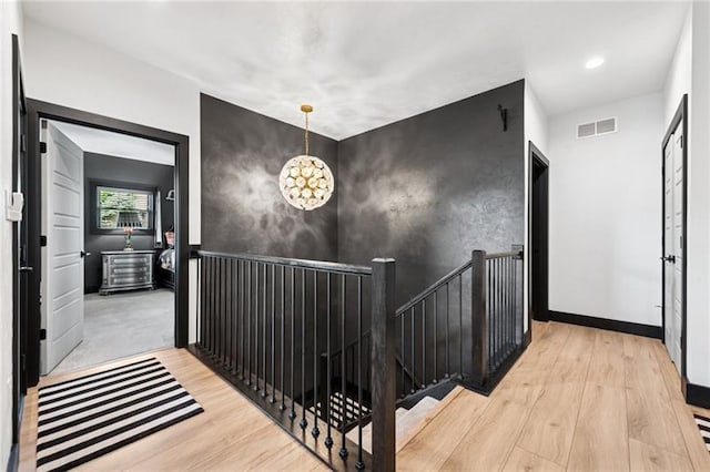 7858 Oscar Ct, North Huntingdon, PA 15642 - stairway featuring wood finished floors and recessed lighting