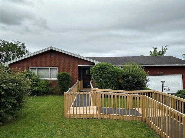1020 Grove St, Hempfield Twp Wml, PA 15601 - view of front of property featuring brick siding, a front yard, an attached garage, and a shingled roof