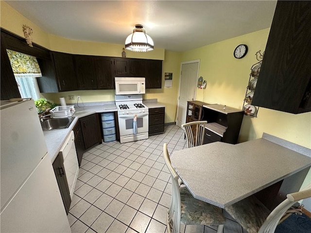 1020 Grove St, Hempfield Twp Wml, PA 15601 - kitchen featuring white appliances, light countertops, and light tile patterned flooring