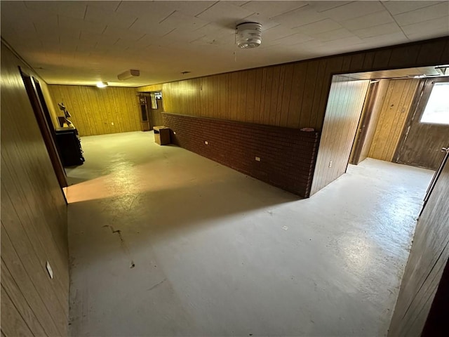 1020 Grove St, Hempfield Twp Wml, PA 15601 - empty room with concrete flooring and wood walls