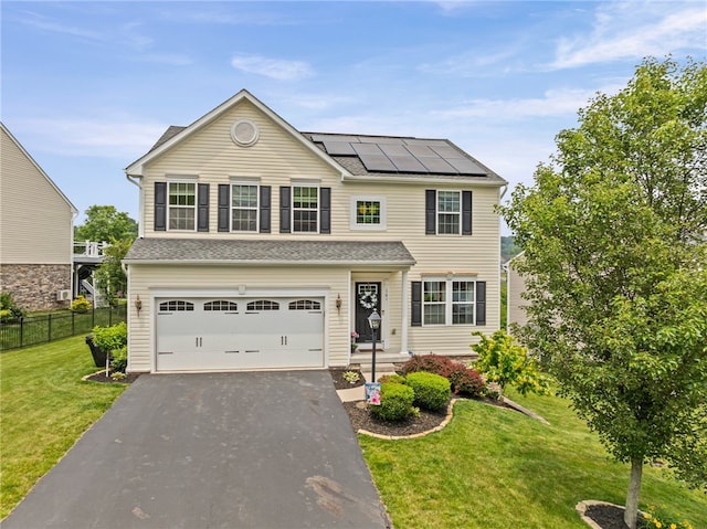 161 Buckingham Dr, Ohio Twp, PA 15237 - traditional home featuring solar panels, driveway, a garage, and roof with shingles