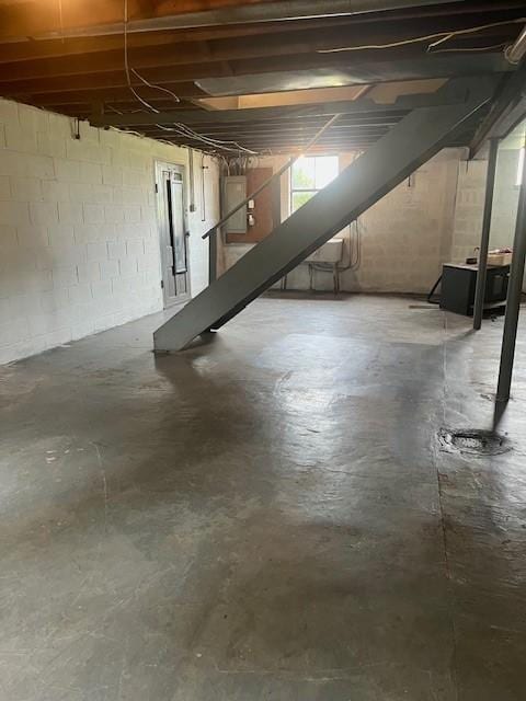 82 Crossridge, Crossridge, PA 15022 - basement with stairs and concrete block wall