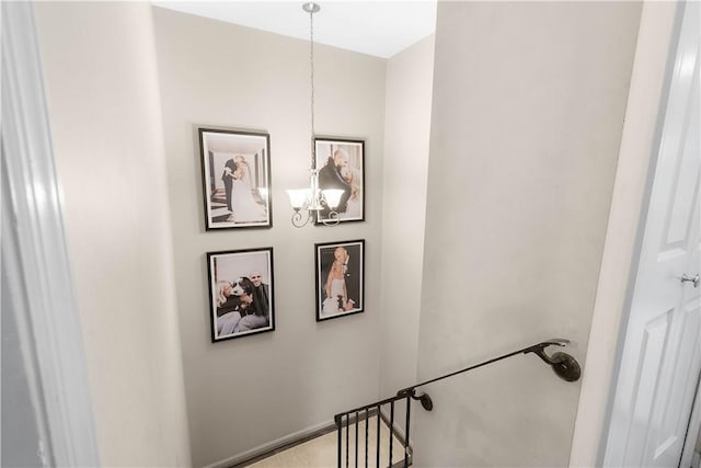 617 Woodcrest Dr, Robinson Twp Nwa, PA 15205 - stairs featuring a chandelier