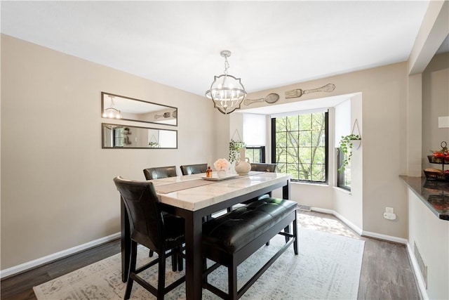 617 Woodcrest Dr, Robinson Twp Nwa, PA 15205 - dining room with a chandelier and wood finished floors