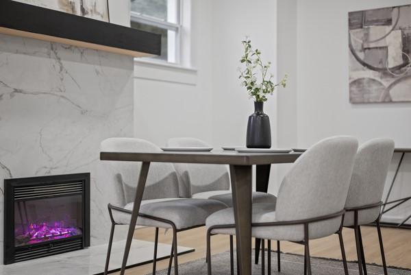 2356 Pittock St, Squirrel Hill, PA 15217 - dining space featuring a premium fireplace and wood finished floors