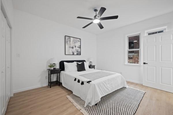 2356 Pittock St, Squirrel Hill, PA 15217 - bedroom featuring light wood-style flooring and a ceiling fan