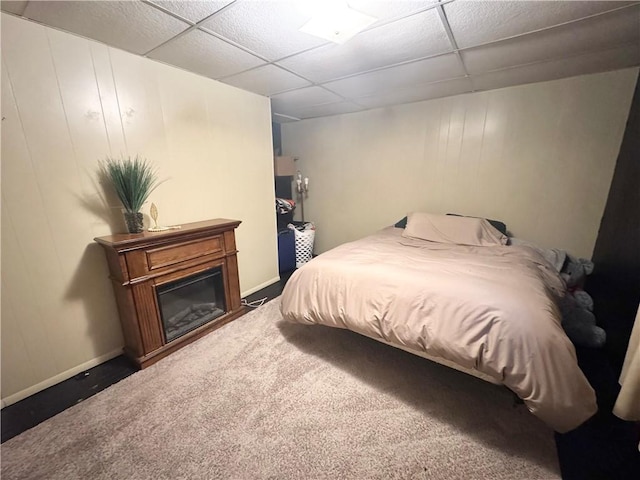 515 Pike Run Dr W, Pike Run Twp, PA 15427 - carpeted bedroom with a drop ceiling and a glass covered fireplace