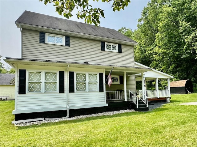 515 Pike Run Dr W, Pike Run Twp, PA 15427 - view of front of property with a front lawn and covered porch