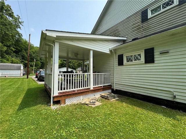 515 Pike Run Dr W, Pike Run Twp, PA 15427 - view of side of property with a lawn and a porch