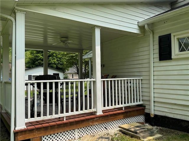 515 Pike Run Dr W, Pike Run Twp, PA 15427 - wooden deck with ceiling fan and a storage shed