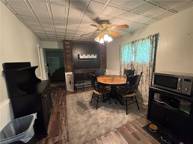 515 Pike Run Dr W, Pike Run Twp, PA 15427 - dining room featuring dark wood-style flooring and a ceiling fan