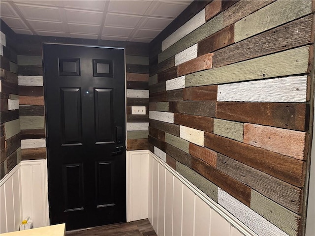 515 Pike Run Dr W, Pike Run Twp, PA 15427 - doorway to outside with wooden walls and dark wood-style floors