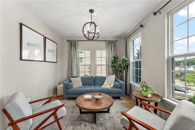 207 Eddie Lewis Dr, Pine Twp Nal, PA 15090 - living area featuring a chandelier and baseboards