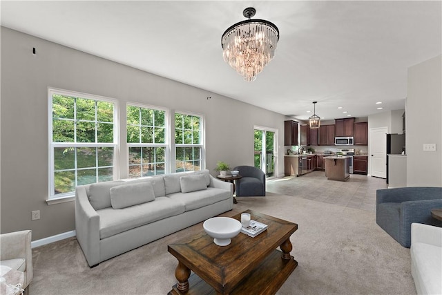 207 Eddie Lewis Dr, Pine Twp Nal, PA 15090 - living room featuring a chandelier, healthy amount of natural light, light carpet, and recessed lighting