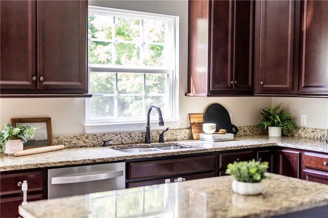 207 Eddie Lewis Dr, Pine Twp Nal, PA 15090 - kitchen with stainless steel dishwasher, healthy amount of natural light, light stone counters, and dark brown cabinets