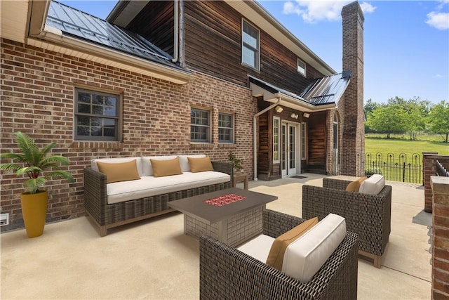 412 Hawthorn Rd, East Finley, PA 15323 - view of patio / terrace featuring an outdoor living space with a fire pit and french doors