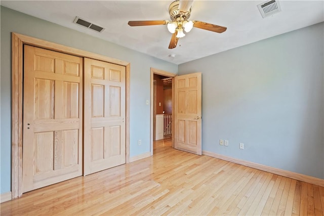 412 Hawthorn Rd, East Finley, PA 15323 - unfurnished bedroom with wood finished floors, a closet, and a ceiling fan