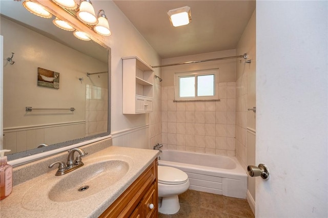 215 Columbia Dr, Center Twp Bea, PA 15001 - full bathroom with tile patterned floors, vanity, tub / shower combination, and wainscoting