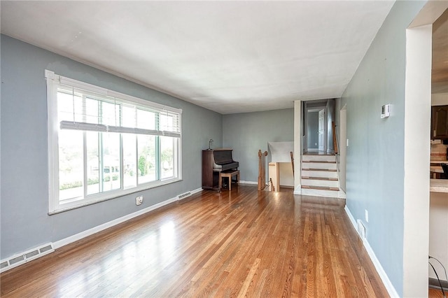 215 Columbia Dr, Center Twp Bea, PA 15001 - living room with wood finished floors and stairs