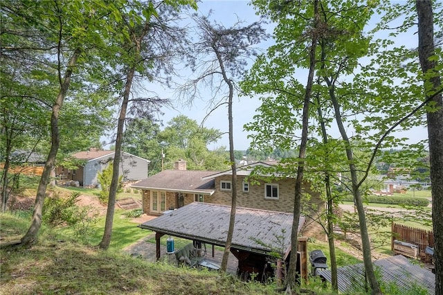 215 Columbia Dr, Center Twp Bea, PA 15001 - rear view of house with a chimney