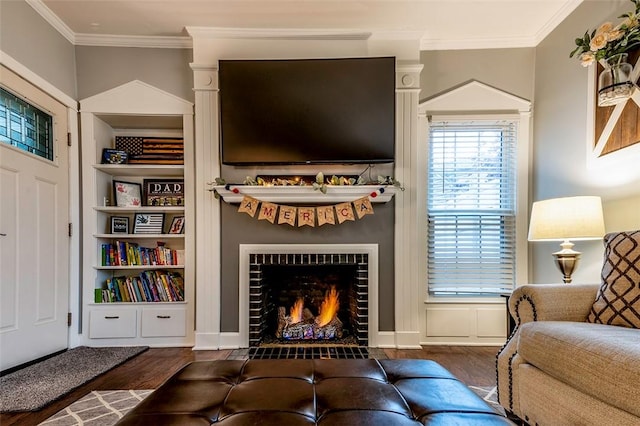 1283 Ashton Rd, Sharon, PA 16146 - living room featuring wood finished floors, ornamental molding, a fireplace with flush hearth, and built in features