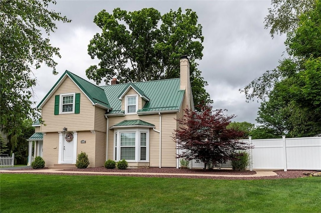1283 Ashton Rd, Sharon, PA 16146 - view of front of house featuring a chimney, a standing seam roof, and a metal roof