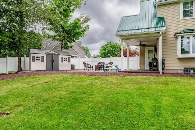 1283 Ashton Rd, Sharon, PA 16146 - fenced backyard with a patio, ceiling fan, and a storage shed