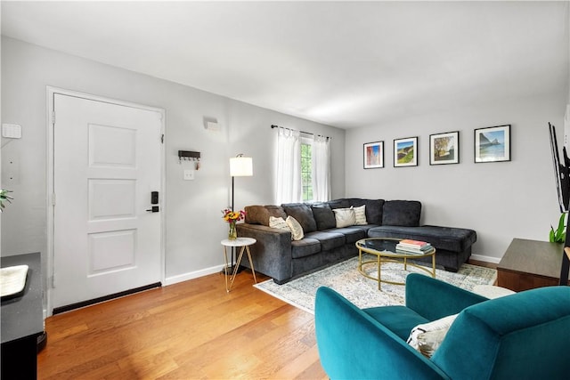 828 Oranmore St, Stanton Heights, PA 15201 - living area featuring light wood-style flooring and baseboards