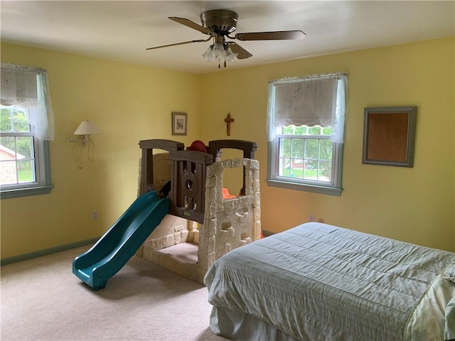 107 Fenwick Dr, Ross Twp, PA 15237 - bedroom with multiple windows, carpet, and ceiling fan