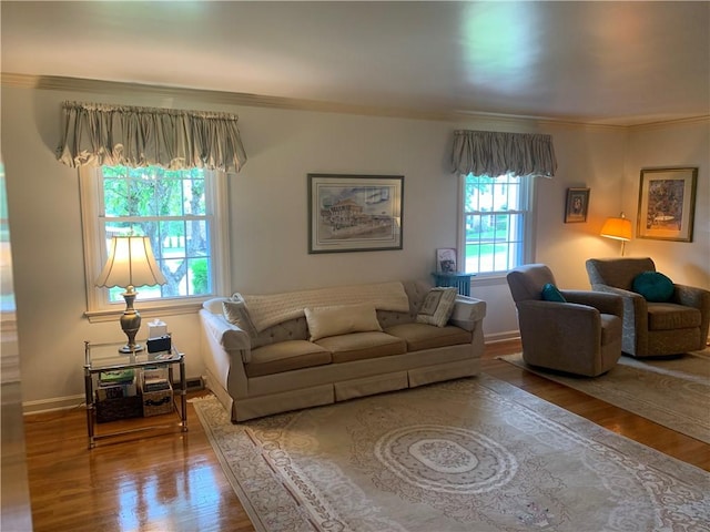 107 Fenwick Dr, Ross Twp, PA 15237 - living area featuring wood finished floors and ornamental molding