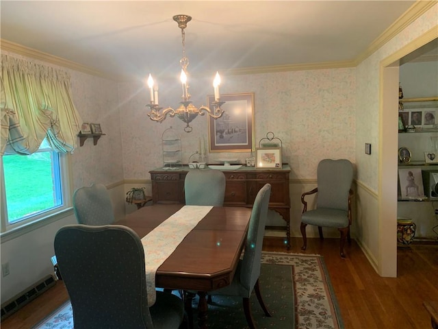 107 Fenwick Dr, Ross Twp, PA 15237 - dining space with wood finished floors, a chandelier, crown molding, wallpapered walls, and a wainscoted wall