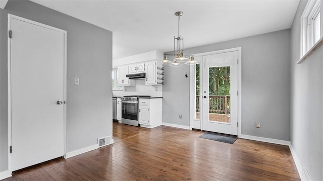 108 Tanglewood Dr, Middlesex Twp, PA 16059 - kitchen with stainless steel range with gas cooktop, healthy amount of natural light, and white cabinetry