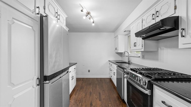 108 Tanglewood Dr, Middlesex Twp, PA 16059 - kitchen featuring stainless steel appliances, under cabinet range hood, and dark countertops