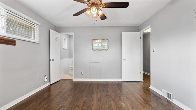 108 Tanglewood Dr, Middlesex Twp, PA 16059 - unfurnished bedroom with wood finished floors, multiple windows, and ensuite bath