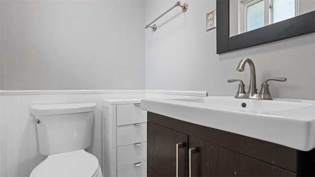 108 Tanglewood Dr, Middlesex Twp, PA 16059 - half bathroom featuring wainscoting and vanity
