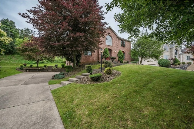 221 William Dr, North Strabane, PA 15317 - view of front of property with a front lawn and brick siding