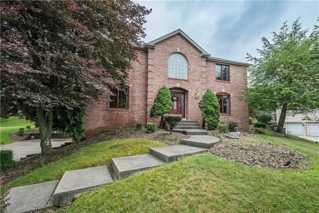 221 William Dr, North Strabane, PA 15317 - view of front facade with a front lawn and brick siding